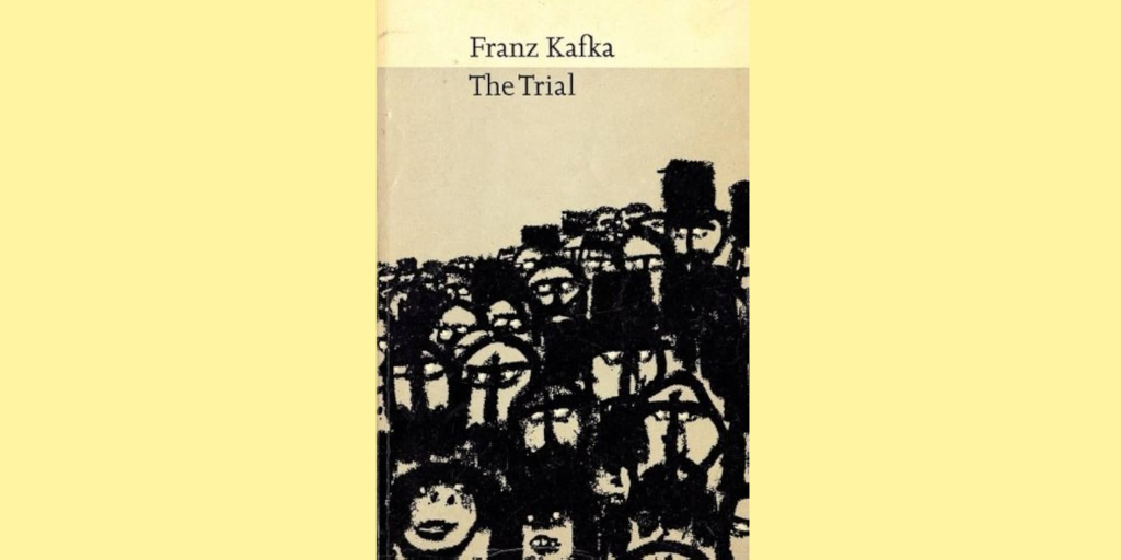 Cover of Franz Kafka's "The Trial", featuring a black and white crowd looking at the viewer.